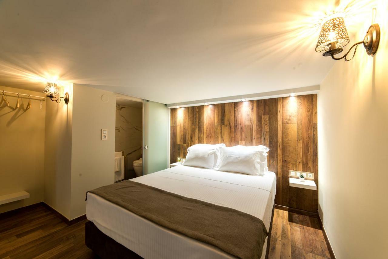Oinoelia Luxury Suites & Residence Потос Екстериор снимка